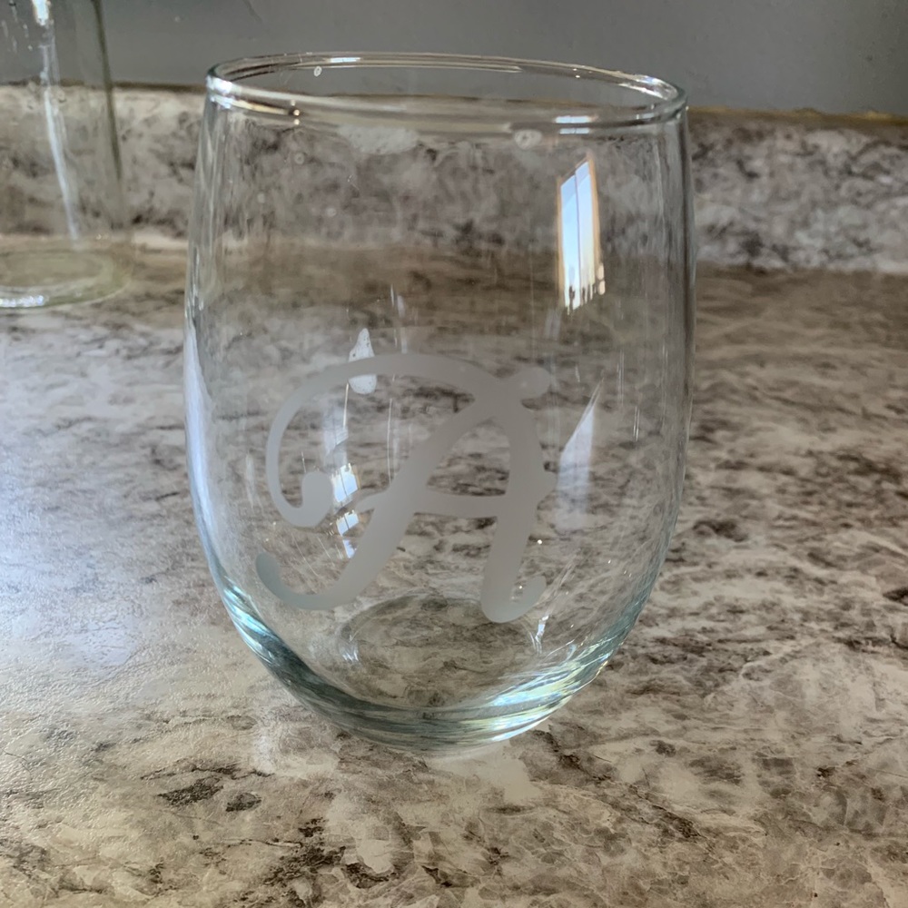 EUC Single stemless wine glass with etched “A”